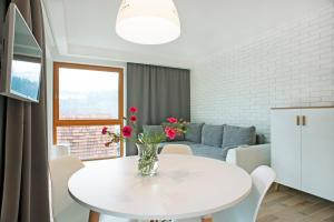 Posedenie v ubytovaní Apartamenty Willowa