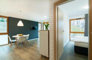 Posteľ alebo postele v izbe v ubytovaní Apartamenty Willowa