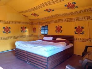 Voodi või voodid majutusasutuse Jungle Stays toas