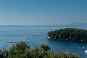 an island in the middle of a large body of water at Villa Rita & Helena in Kalami