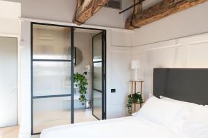 Postel nebo postele na pokoji v ubytování Hotel 5 Colonne