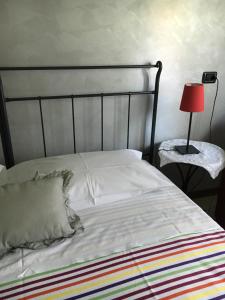 Postel nebo postele na pokoji v ubytování Casa Chiara B&B