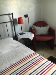 Postel nebo postele na pokoji v ubytování Casa Chiara B&B