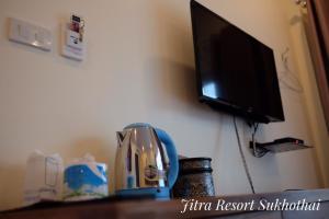 TV a/nebo společenská místnost v ubytování Jitra Resort