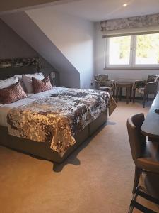Postel nebo postele na pokoji v ubytování Seamill House Hotel