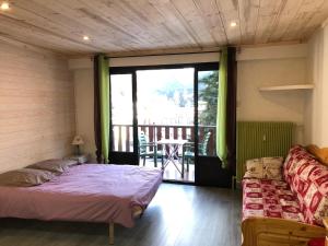 Giường trong phòng chung tại Le Galtas