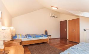 Posteľ alebo postele v izbe v ubytovaní Modern new flat next to river Cetina