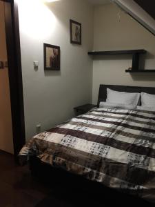 Posteľ alebo postele v izbe v ubytovaní Vml Premium Apartman