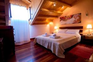 Un ou plusieurs lits dans un hébergement de l'établissement Attic flat at San Giacomo square-Corfu town