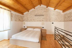 Krevet ili kreveti u jedinici u okviru objekta Casa Bumbara