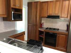 A kitchen or kitchenette at Jean Street Home away from home