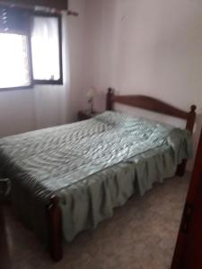 Ένα ή περισσότερα κρεβάτια σε δωμάτιο στο Casa Galicia