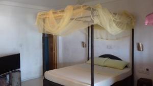 Postel nebo postele na pokoji v ubytování Villa crocodile beach