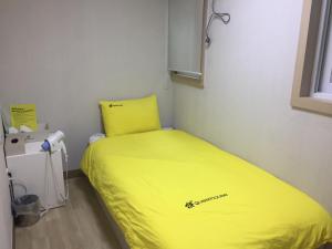 
A bed or beds in a room at 24 Guesthouse KyungHee University
