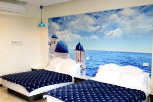 Katil atau katil-katil dalam bilik di Outingfun Bed and Breakfast