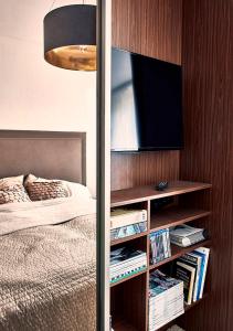 Posteľ alebo postele v izbe v ubytovaní Forest Park by Zoom Apartments