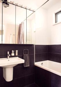 Kúpeľňa v ubytovaní Forest Park by Zoom Apartments