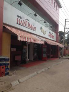 a store with a sign for a hamlinaminastery at Hotel Hanuman in Mangalore