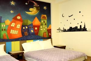 Katil atau katil-katil dalam bilik di Outingfun Bed and Breakfast