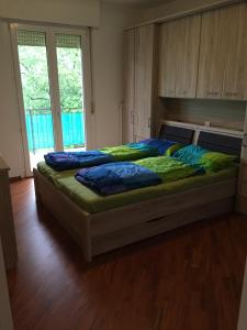 Cama o camas de una habitación en Appartamento nel Cuore di Bolzano