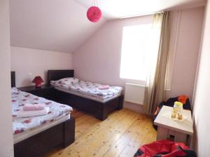 Ένα ή περισσότερα κρεβάτια σε δωμάτιο στο Anano Guest House