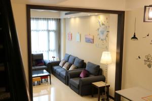 Ruang duduk di Outingfun Bed and Breakfast