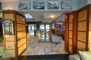 a store with a lobby with glass doors at Istankoy Hotel in Kusadası