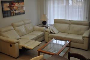 A seating area at Sand 228 Home