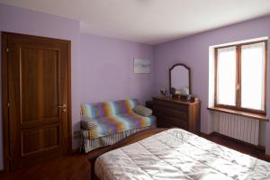 Postel nebo postele na pokoji v ubytování La Casa di Cristina