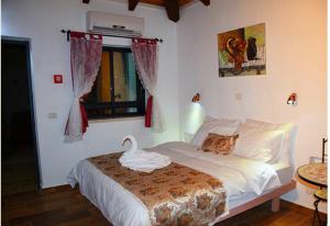 Postel nebo postele na pokoji v ubytování Mango Holiday Rooms
