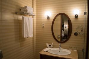 Kúpeľňa v ubytovaní Mirage Medic Hotel
