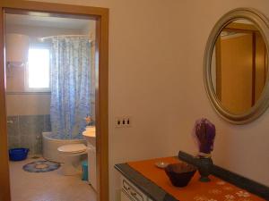 Kylpyhuone majoituspaikassa Apartment Marina