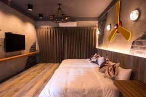 Voodi või voodid majutusasutuse Meet the Bay Homestay toas