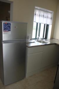 Kuchyň nebo kuchyňský kout v ubytování St Joseph Penthouse
