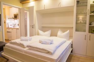 Ένα ή περισσότερα κρεβάτια σε δωμάτιο στο Haus Horizont Fewo Nr 2
