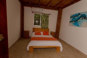 Letto o letti in una camera di Tuzco Lodge