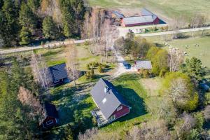 an aerial view of a farm with a barn at Holiday Home with Sauna in Kassari