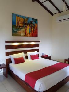 Postel nebo postele na pokoji v ubytování Sea Breeze Deluxe Inn