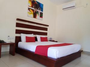 Postel nebo postele na pokoji v ubytování Sea Breeze Deluxe Inn