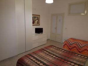 TV a/nebo společenská místnost v ubytování B&B Nonna Rosaria