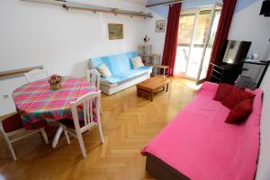 Postel nebo postele na pokoji v ubytování Apartment Toma