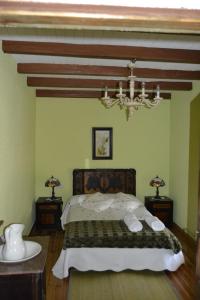 En eller flere senger på et rom på Casa Rural La Calceta