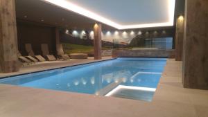 Bazén v ubytovaní Hotel Flora Alpina alebo v jeho blízkosti