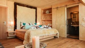 Postel nebo postele na pokoji v ubytování Schneekarhütte + 37 fotografií
