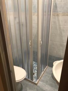 Koupelna v ubytování Hotel Amica