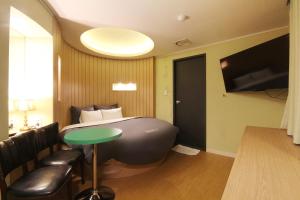 TV a/nebo společenská místnost v ubytování Hotel Chowon