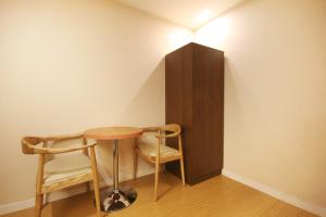 Palanda nebo palandy na pokoji v ubytování Hotel Chowon