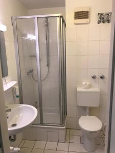 Ein Badezimmer in der Unterkunft Gästehaus Alpinia