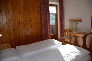 Postel nebo postele na pokoji v ubytování Pilat