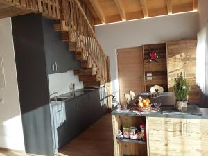 Kuchyň nebo kuchyňský kout v ubytování chalet soredl